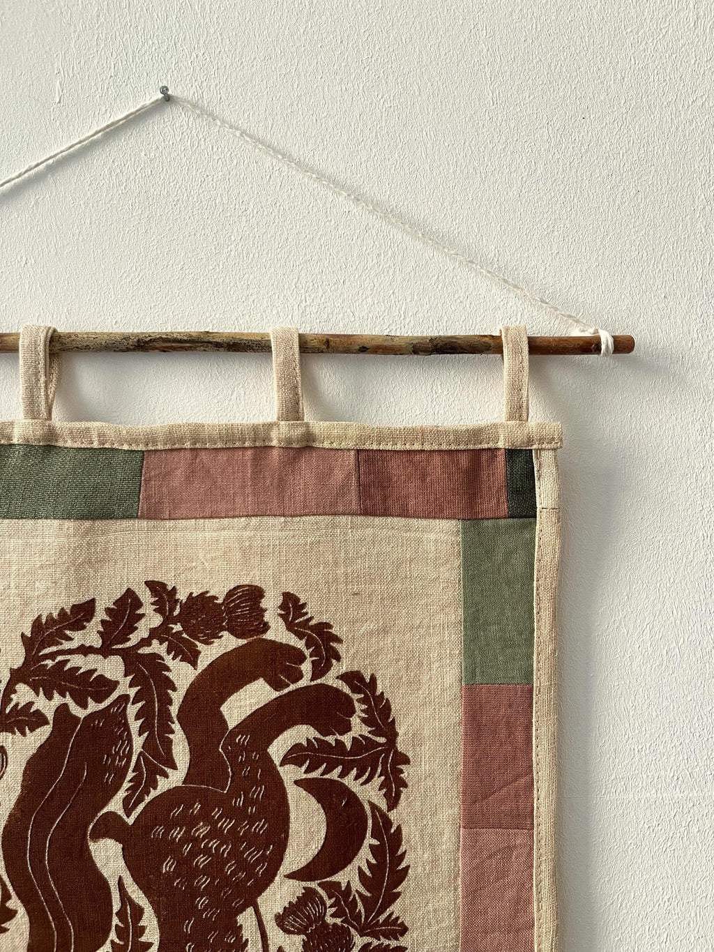 Hand-printed fabric tapestry with quilted frame “Hare and thistle”
