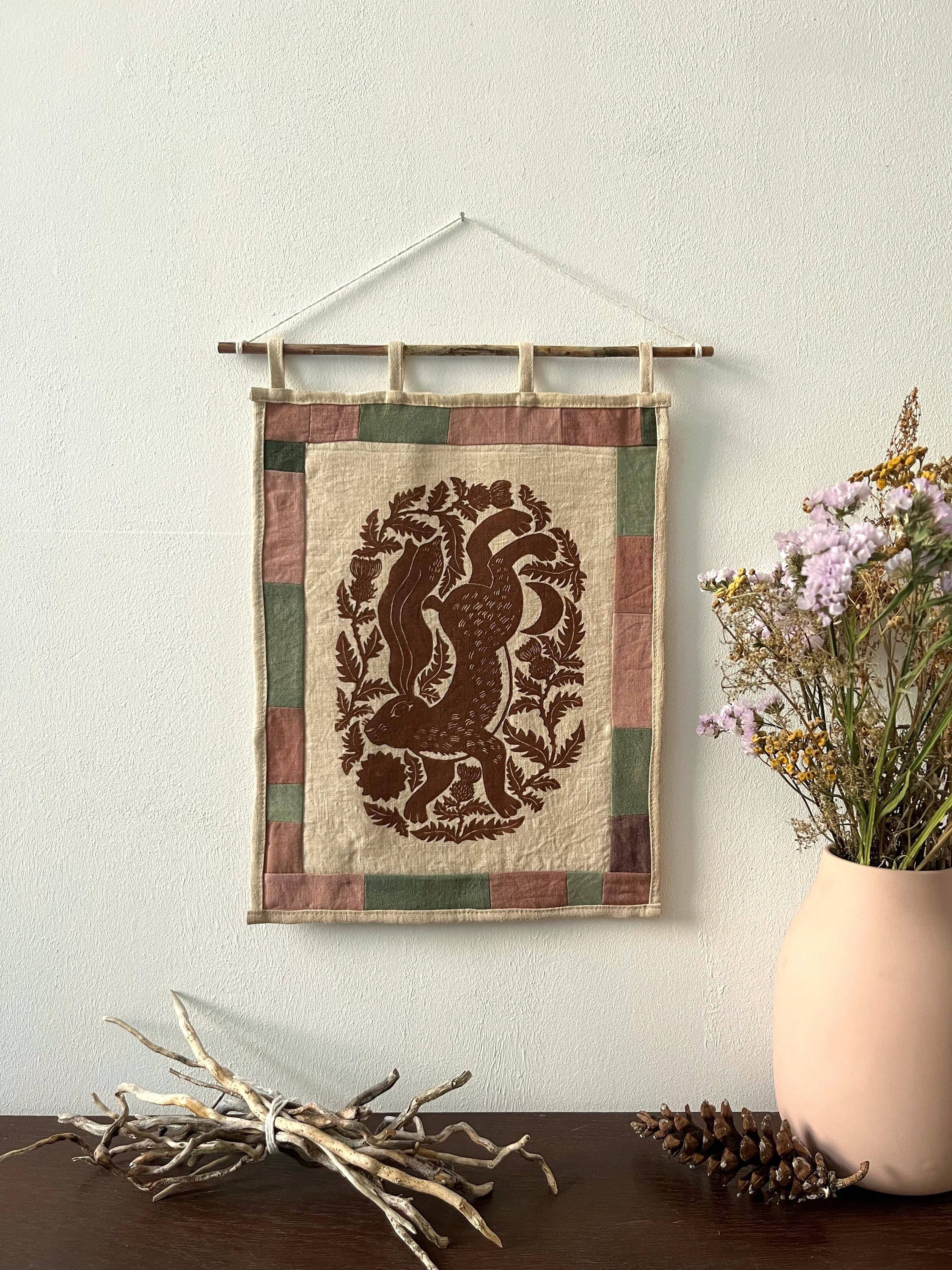 Hand-printed fabric tapestry with quilted frame “Hare and thistle”