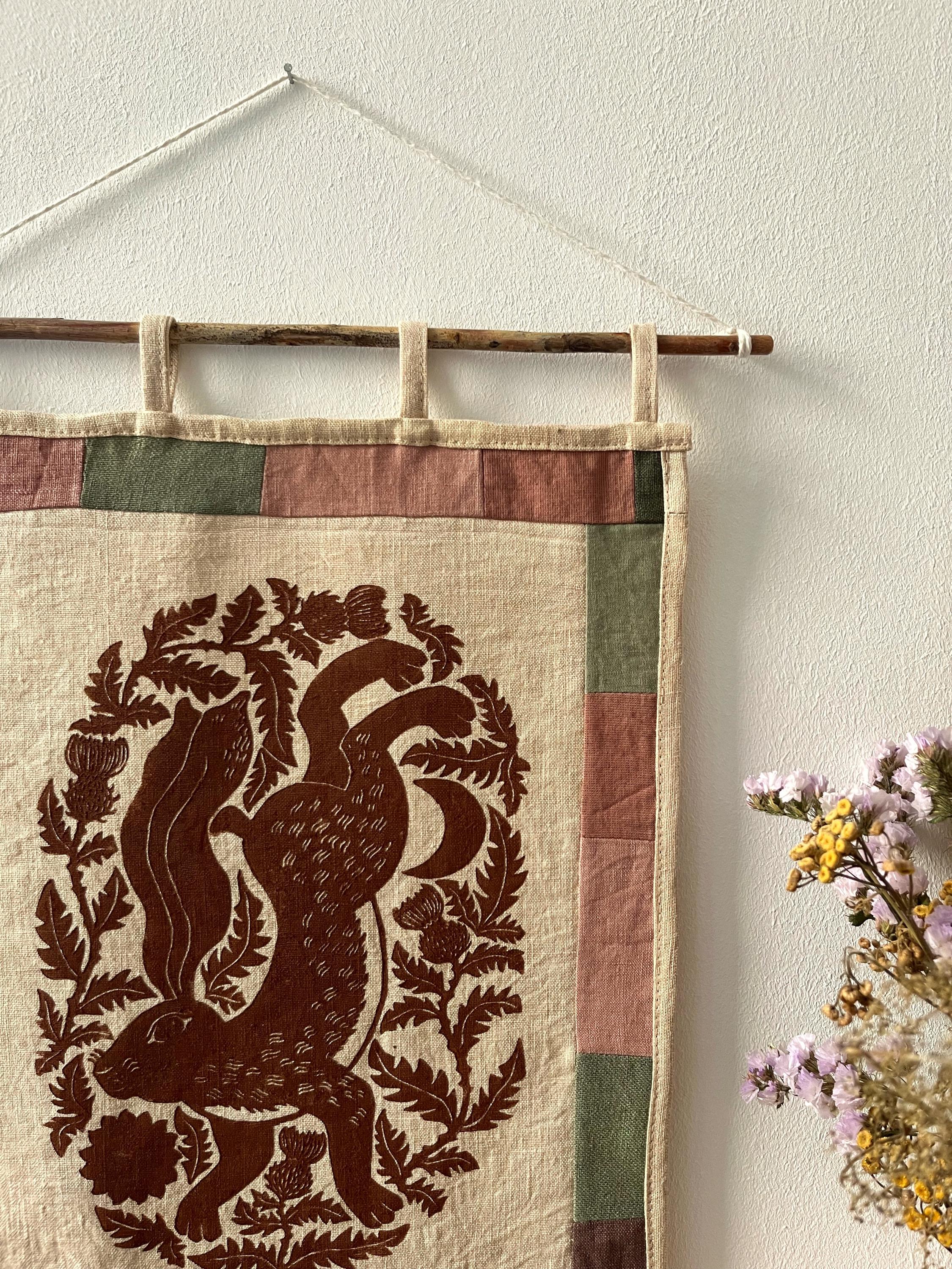 Hand-printed fabric tapestry with quilted frame “Hare and thistle”