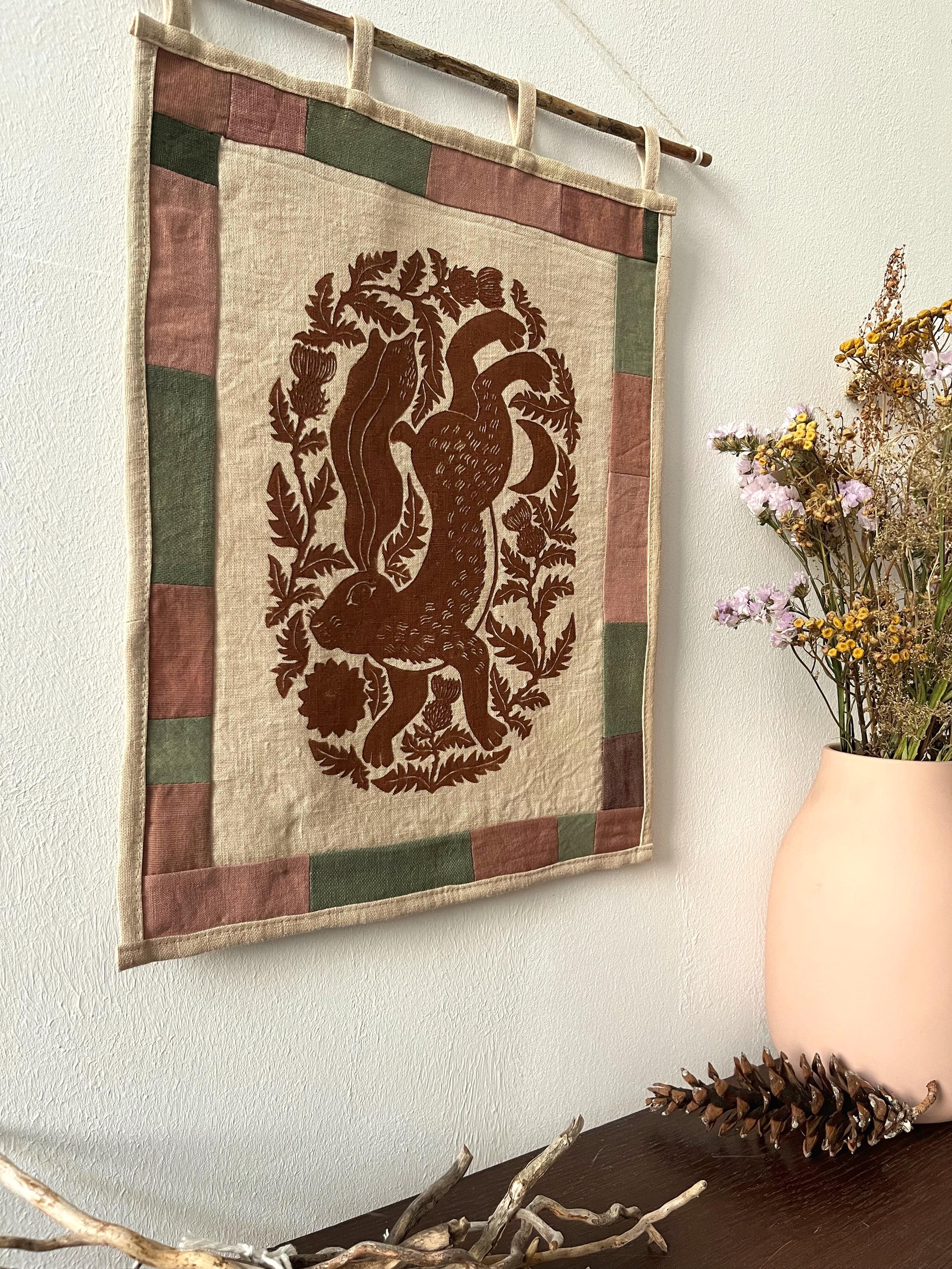 Hand-printed fabric tapestry with quilted frame “Hare and thistle”