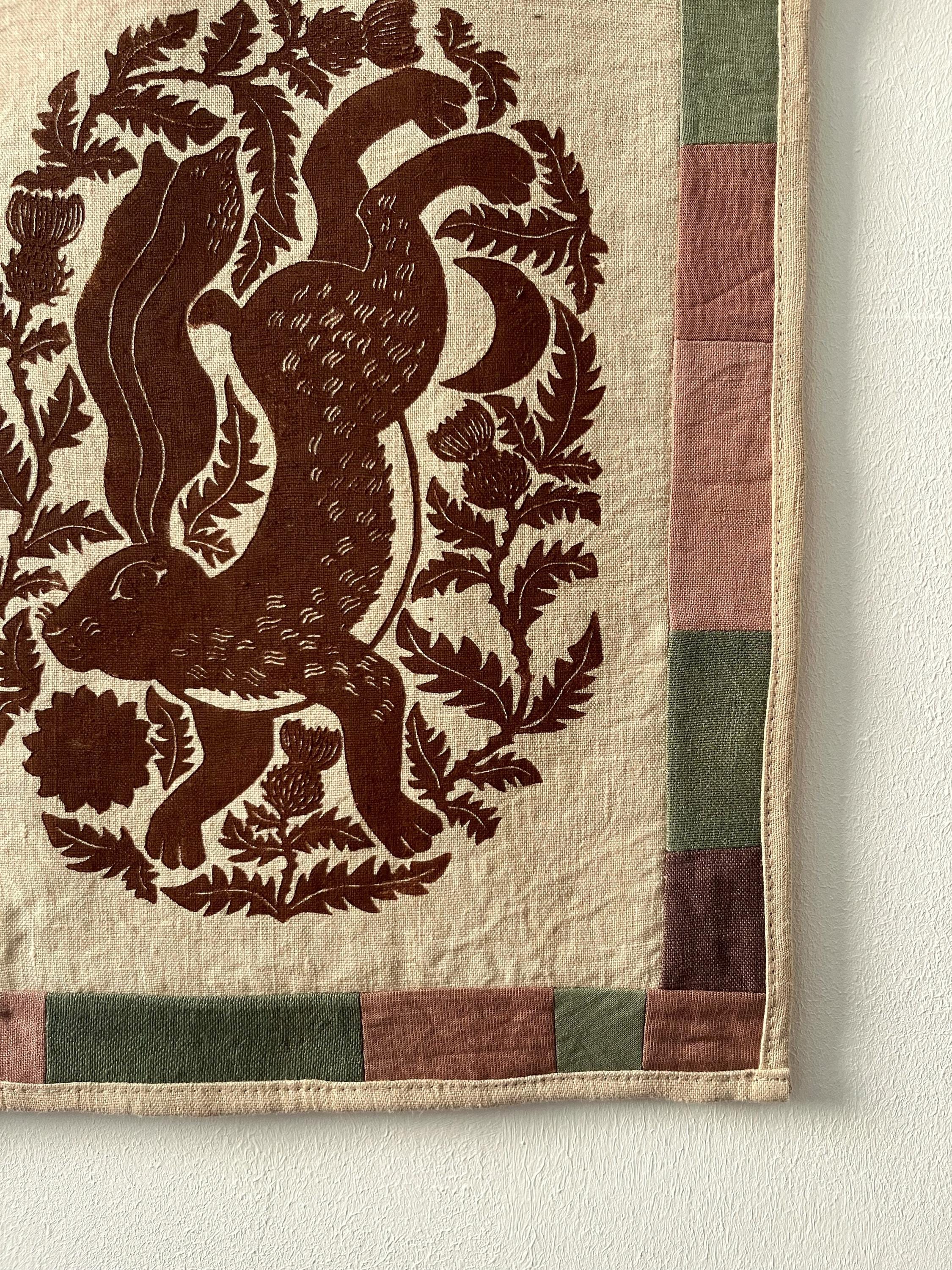 Hand-printed fabric tapestry with quilted frame “Hare and thistle”