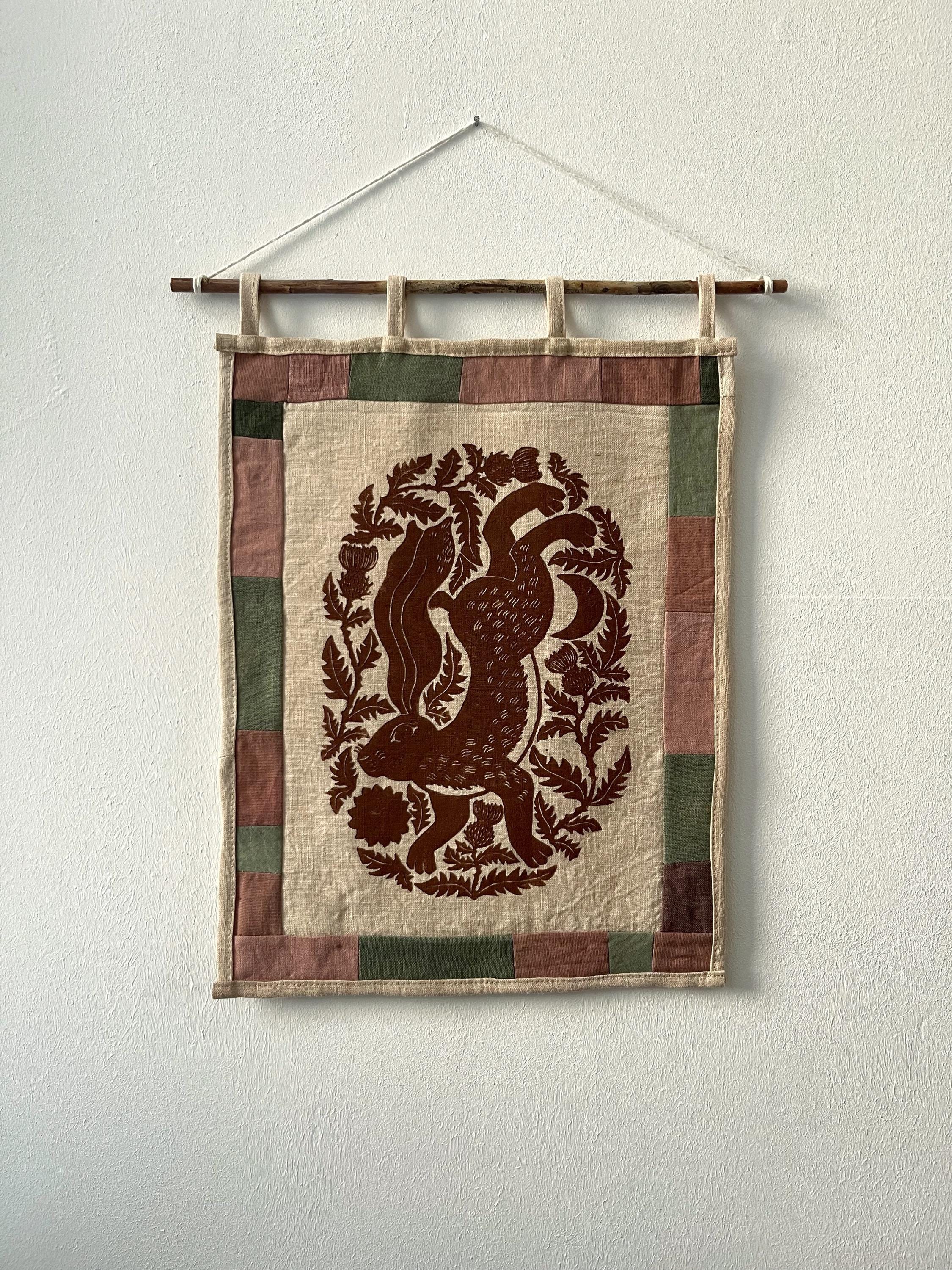 Hand-printed fabric tapestry with quilted frame “Hare and thistle”