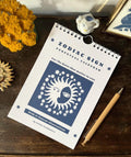 Zodiac sign perpetual calendar illustrated with linocuts