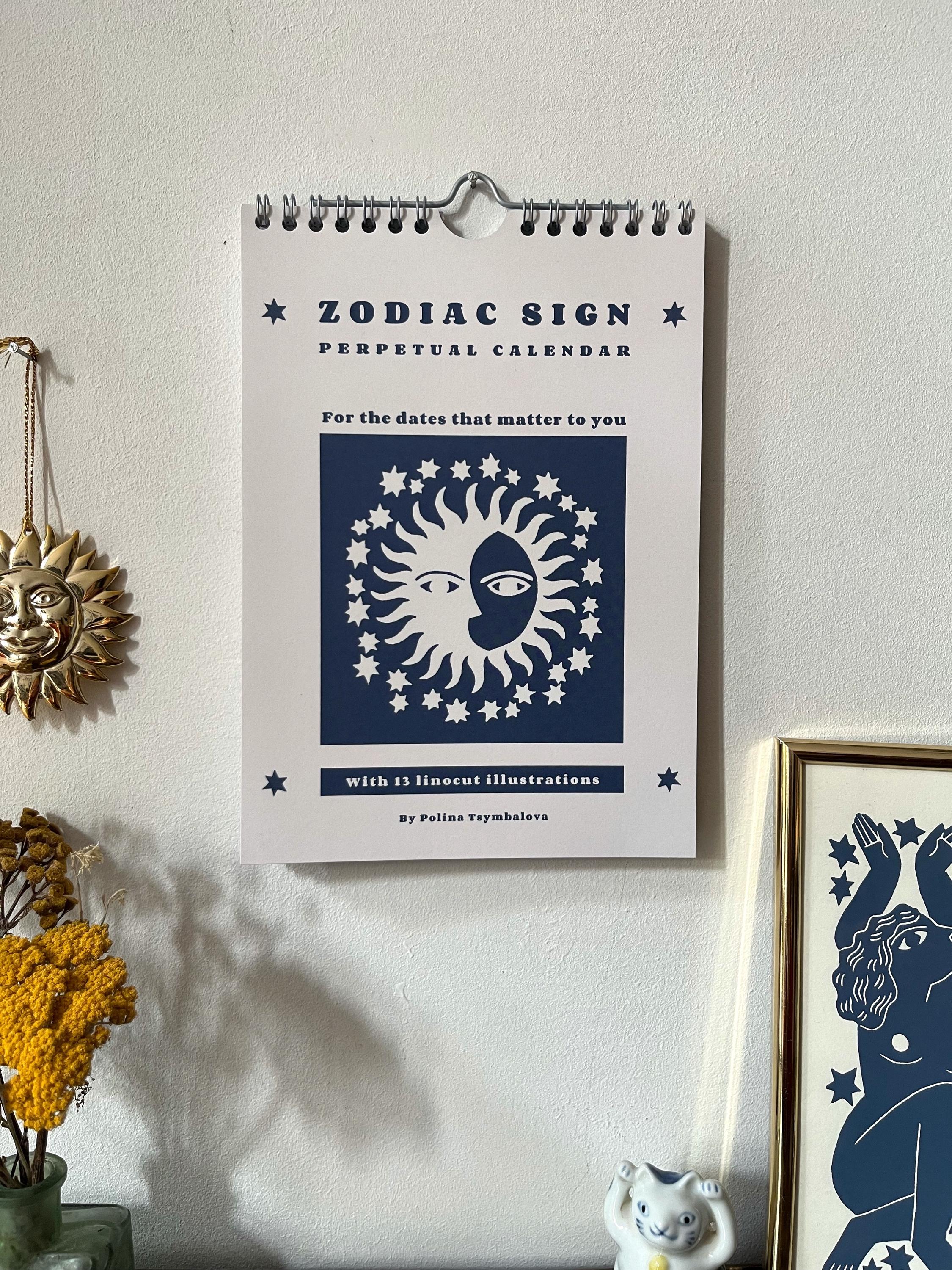 Zodiac sign perpetual calendar illustrated with linocuts