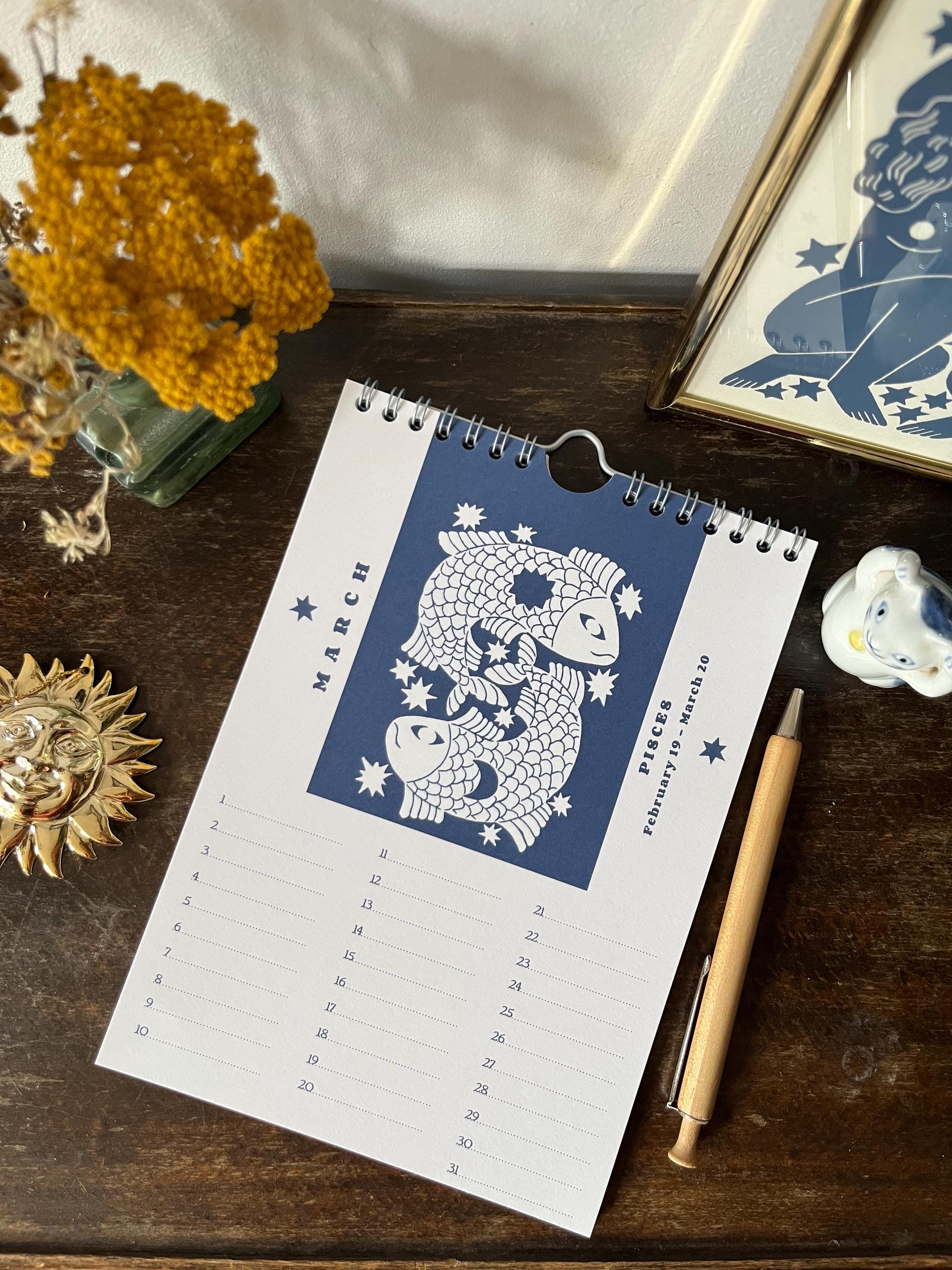 Zodiac sign perpetual calendar illustrated with linocuts